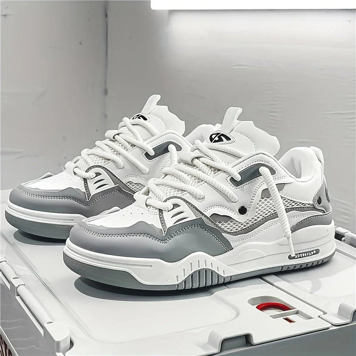 Side view of men's chunky trainers showing cushioned sole and visible air unit detail