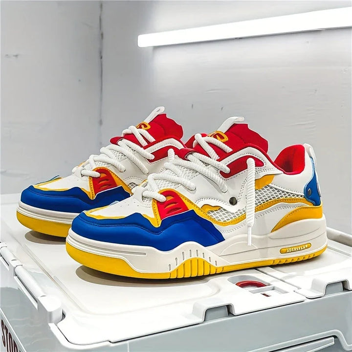 Close-up of men's chunky trainers featuring padded collar and contrasting stitching details