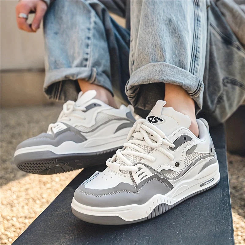 Rear view of men's chunky trainers displaying heel tab and durable tread pattern
