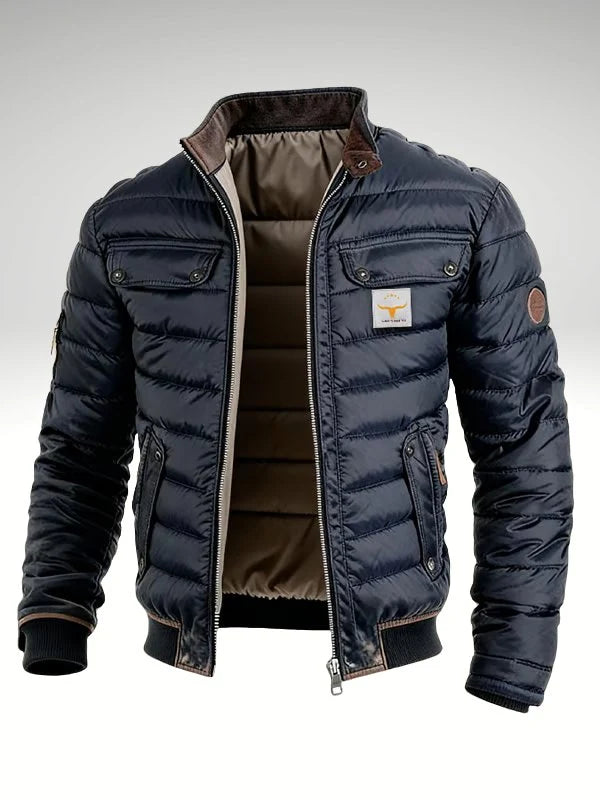 Close-up view of men's quilted bomber jacket showing horizontal quilted panelling and zip fastening detail