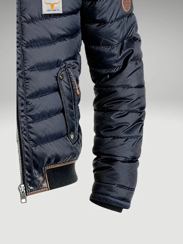 Side profile of men's navy bomber jacket highlighting relaxed fit silhouette and ribbed hem construction