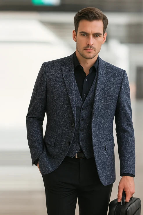 Back view of men's tailored blazer showing structured fit and centre vent