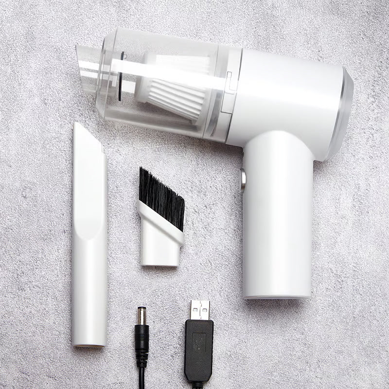Compact car vacuum cleaner featuring pistol-grip design for comfortable extended use