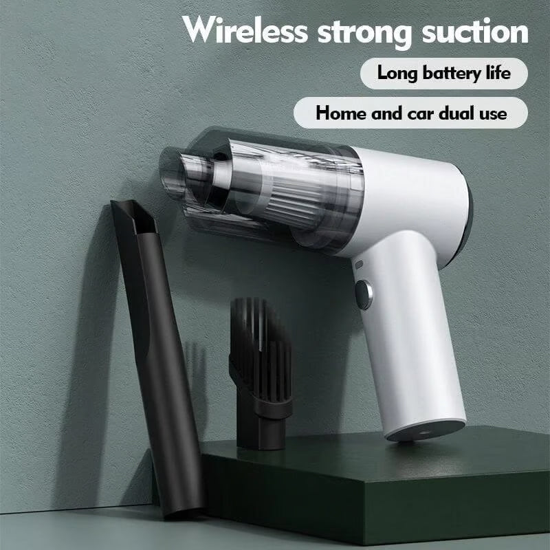 Portable car vacuum cleaner showing pistol-grip handle and cylindrical collection chamber design