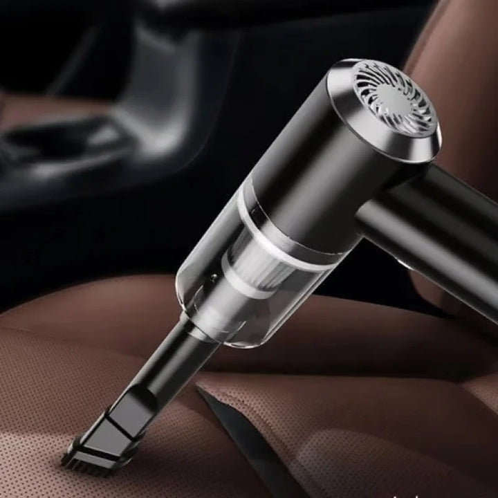 Handheld vacuum cleaner with integrated LED lighting for illuminating cleaning areas in vehicles