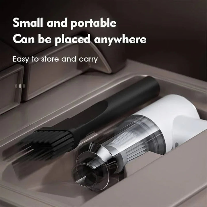 White portable vacuum with clear cylindrical chamber for monitoring dirt collection levels