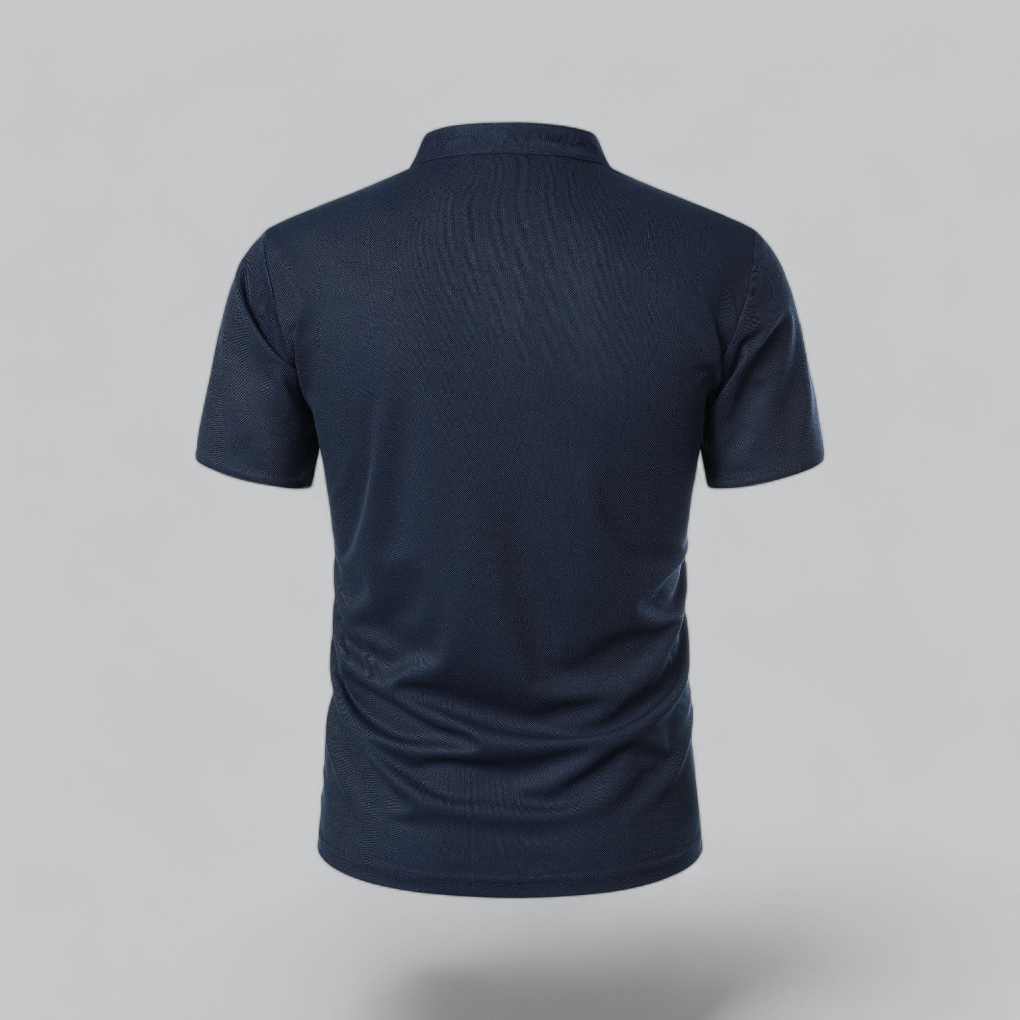 Close-up of men's collarless polo showing contrast tipping and fabric quality