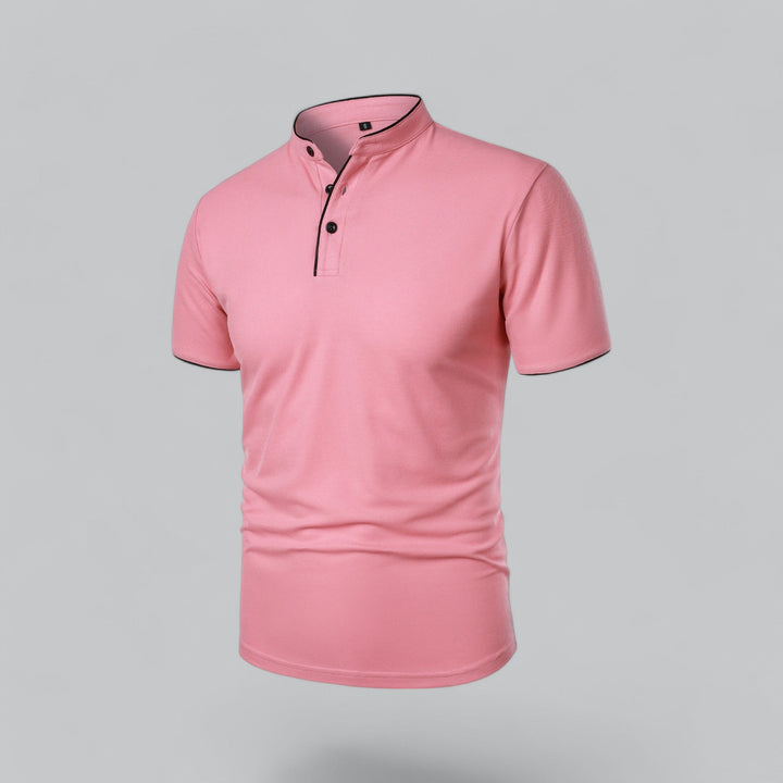 Men's collarless polo in green worn with white trousers for relaxed look