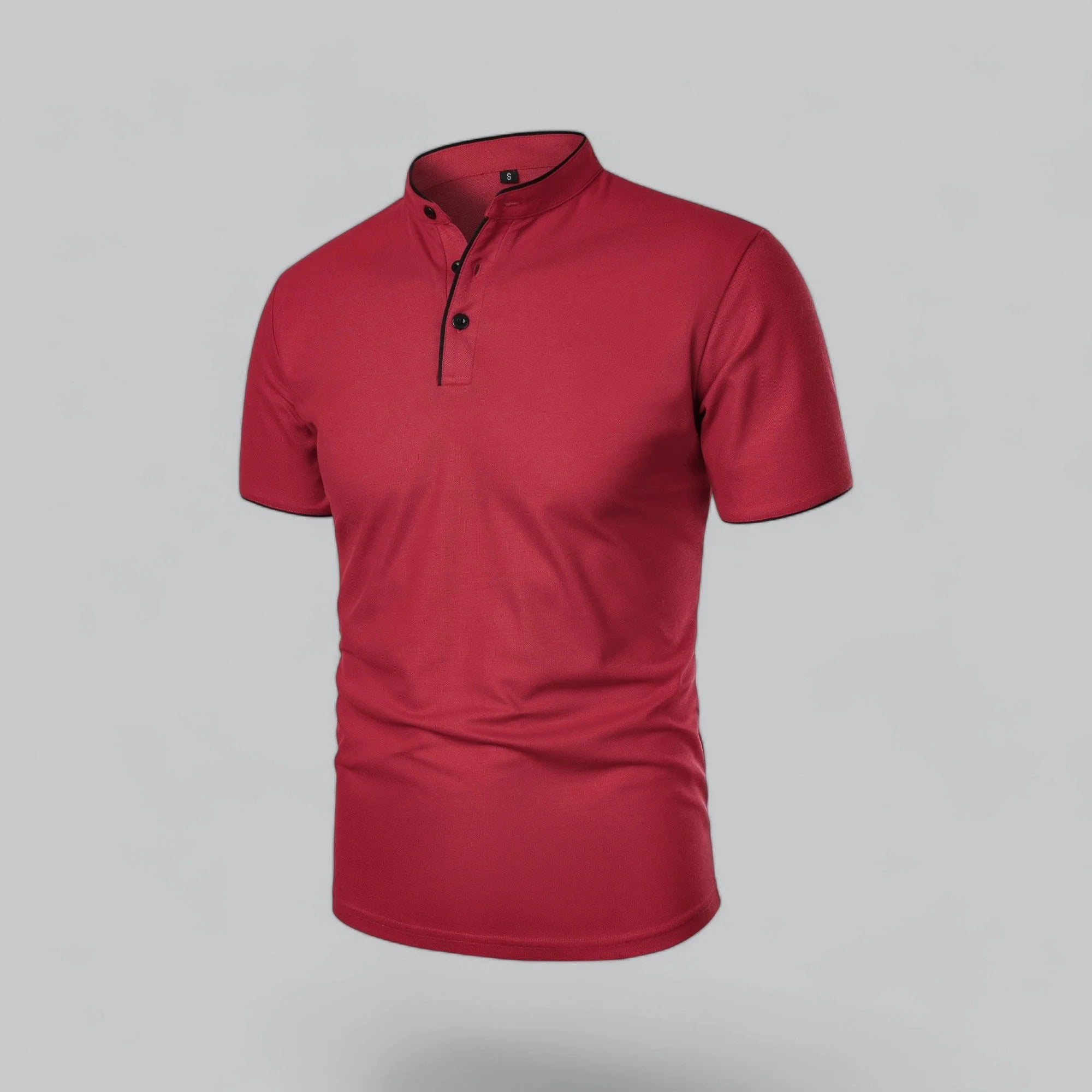 Close-up of men's collarless polo showing contrast sleeve tipping and button detail
