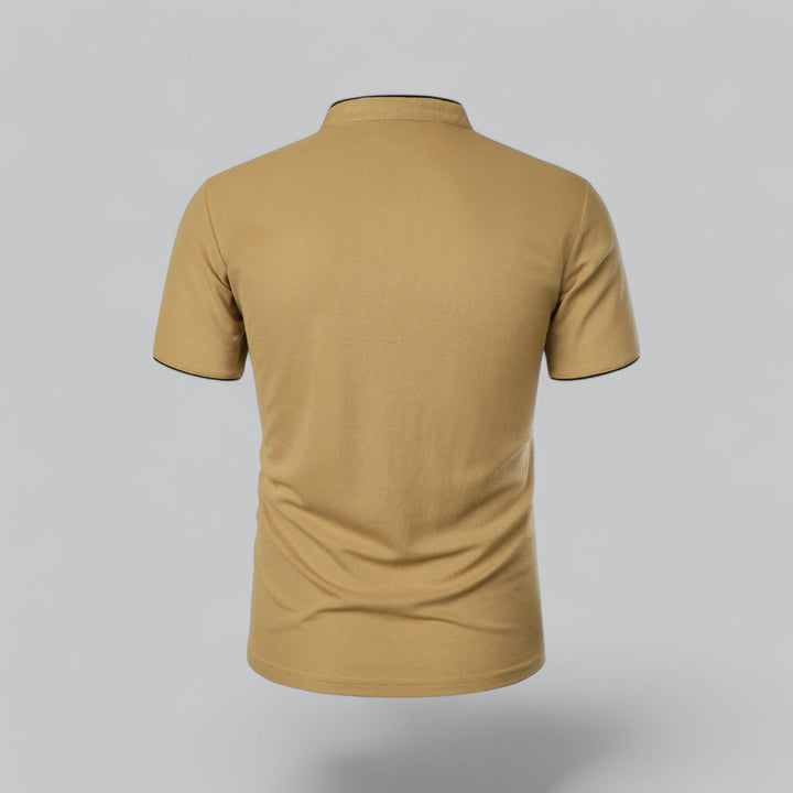 Side profile of men's tailored collarless polo shirt showing clean silhouette and sleeve tipping