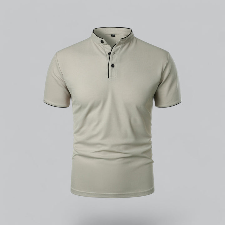 Detail shot of men's polo shirt showing contrast sleeve tipping and lightweight fabric texture