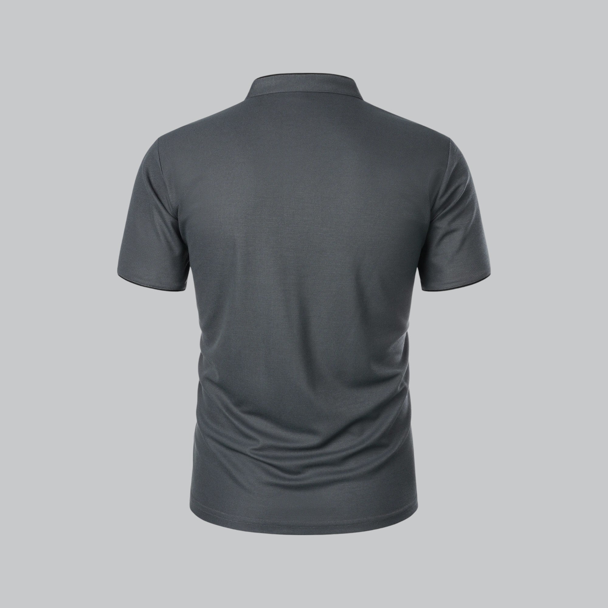 Close-up of men's polo shirt fabric showing smooth finish and structured drape