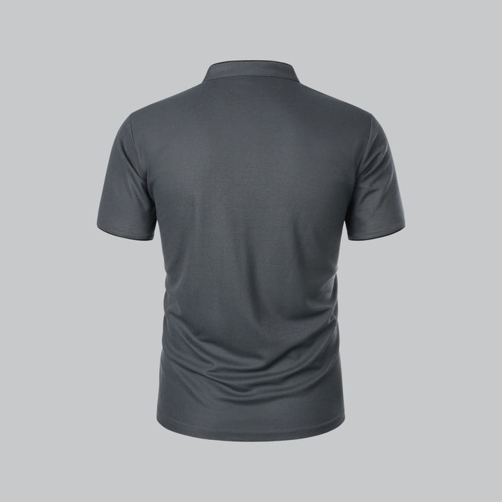 Close-up of men's polo shirt fabric showing smooth finish and structured drape