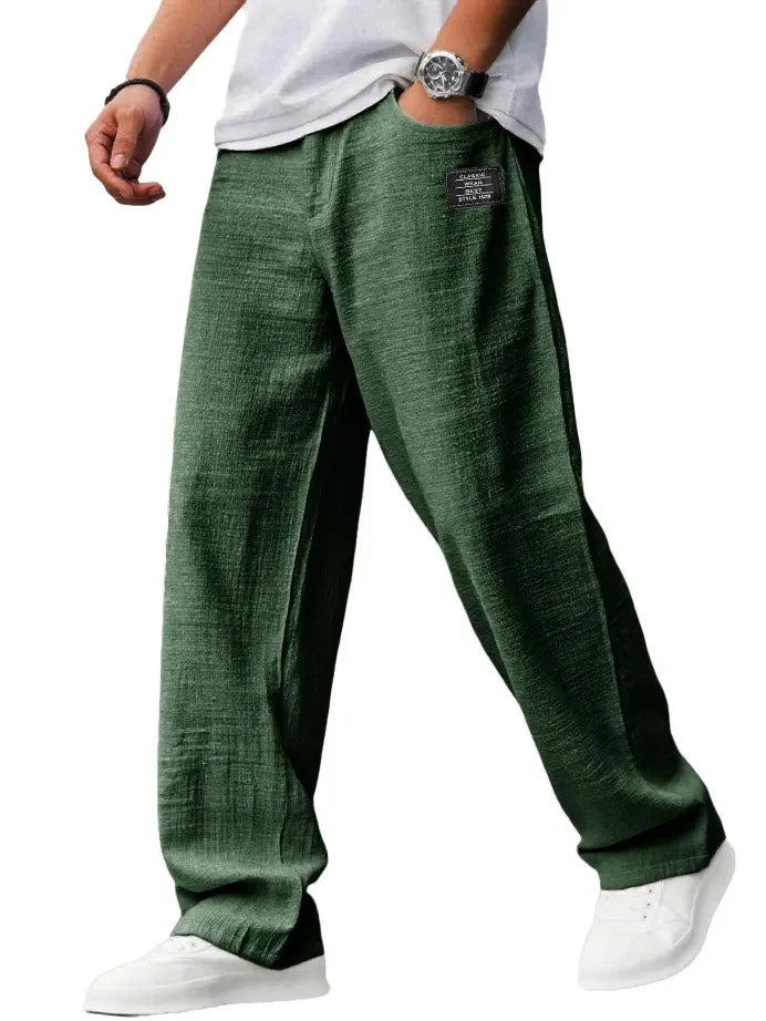 Men's straight leg trousers in motion showing unrestricted movement and comfortable wide-leg fit