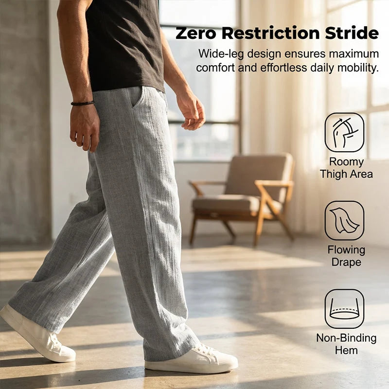 Men's grey straight leg trousers styled for casual warm-weather wear with trainers