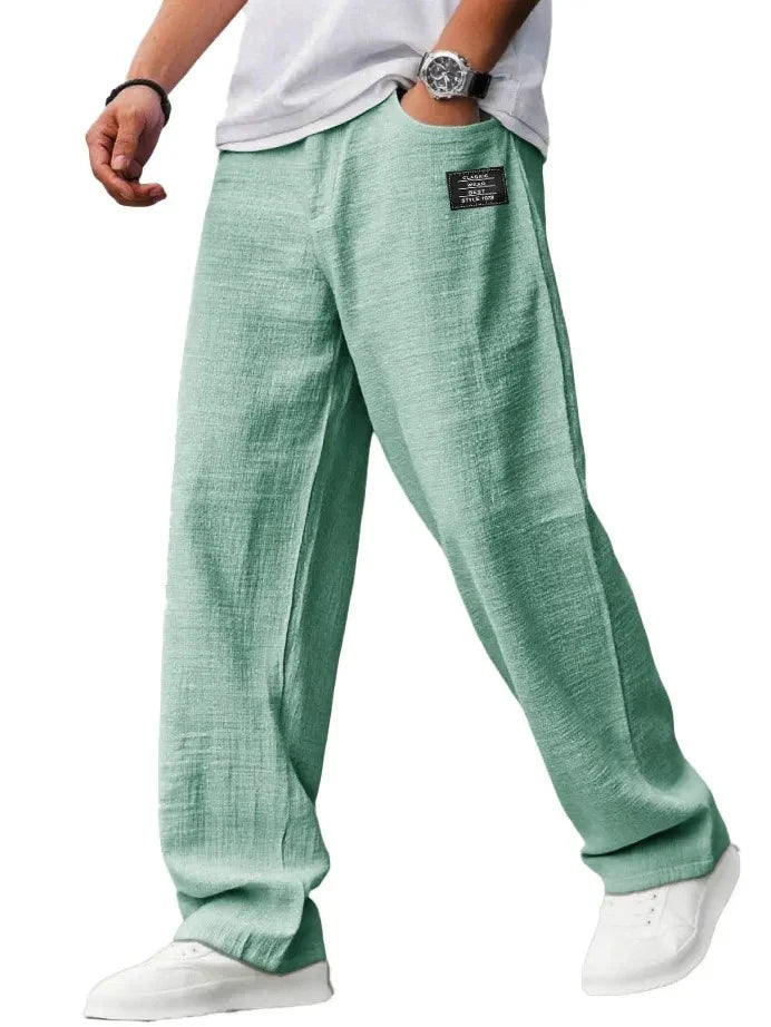 Close detail of ribbed texture fabric on men's relaxed fit straight leg trousers