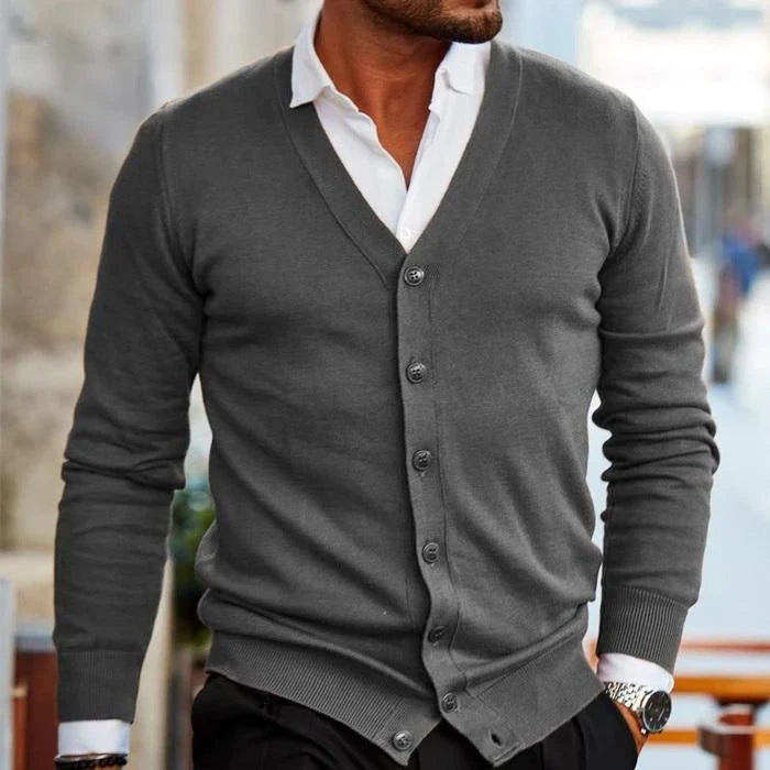 Detail shot of cardigan knit construction and button-front closure design