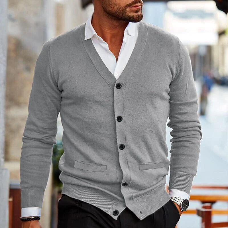 Full-length view of men's button cardigan showing ribbed hem and sleeve cuffs