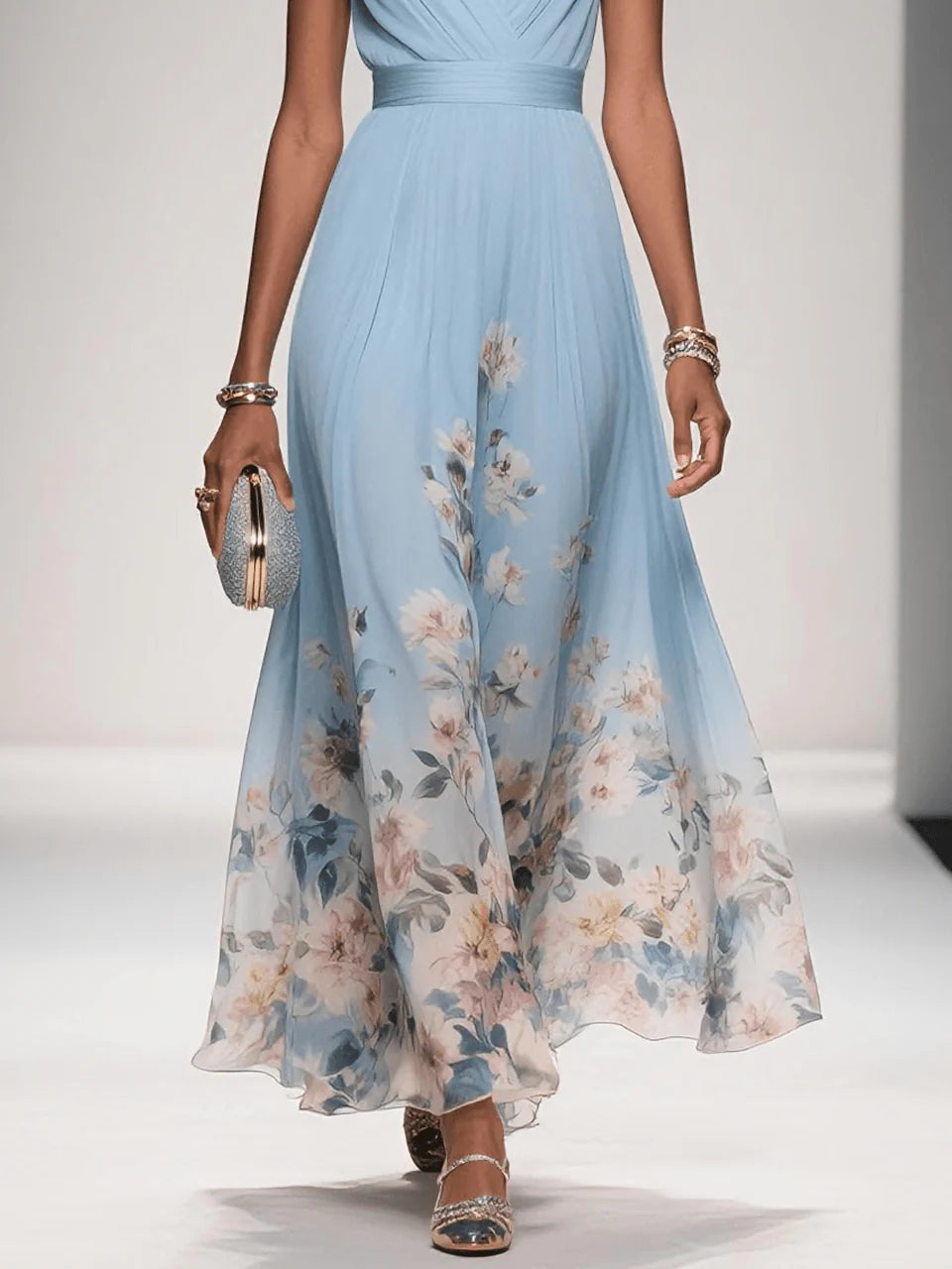 Side angle of sleeveless maxi dress with wide shoulder straps and flowing skirt