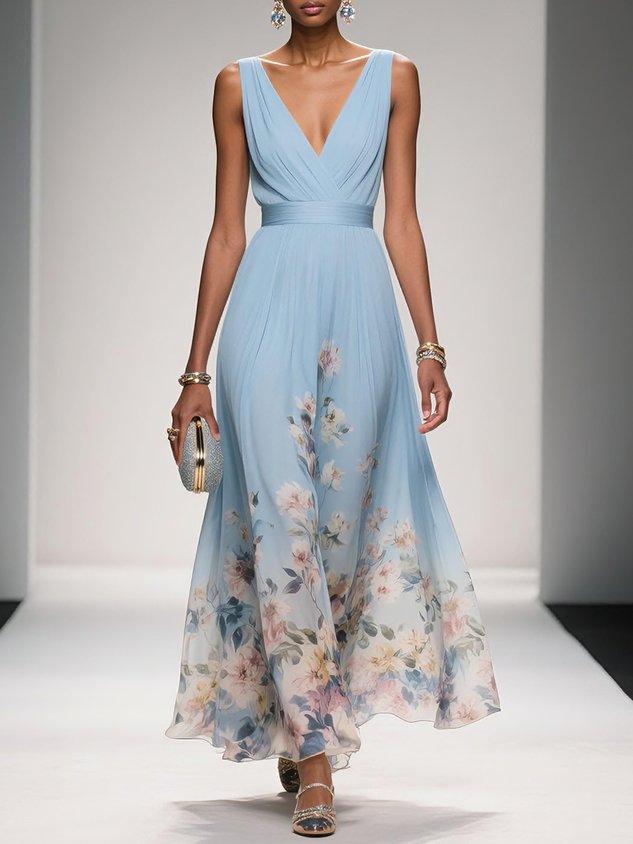 Floral print maxi dress modelled showing graceful drape and movement of fabric