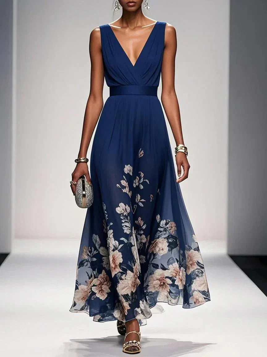 Side view of floral print maxi dress showing pleated bodice and gradient floral pattern detail