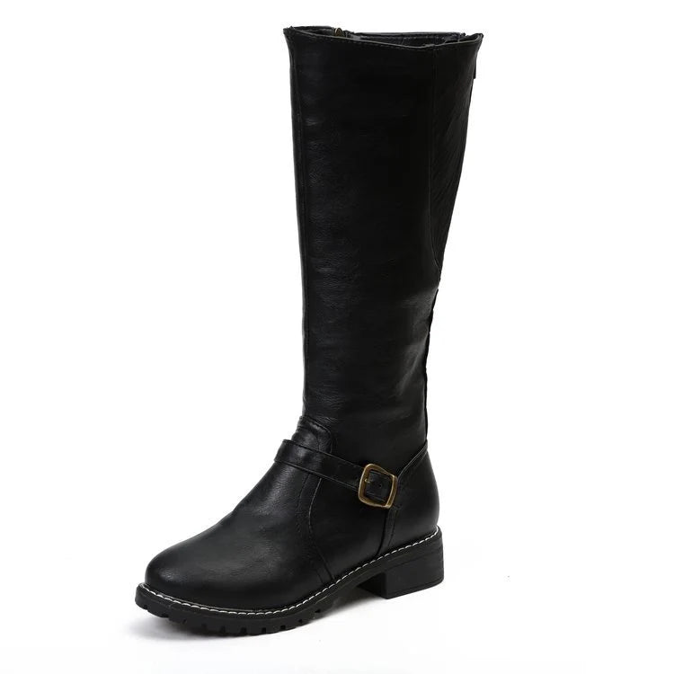 Close-up of women's knee-high boots showing smooth finish and ankle buckle strap