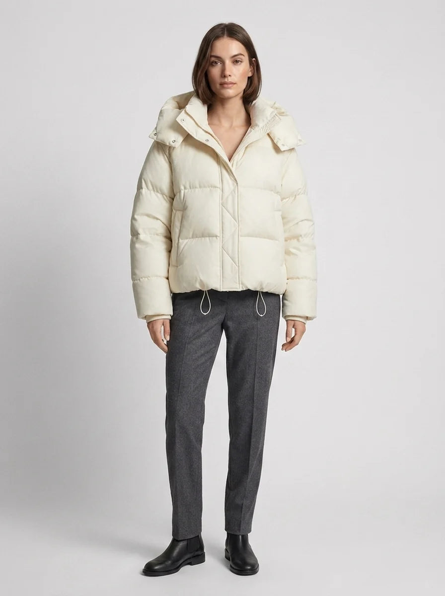 Women's oversized puffer jacket collar and hood detail with snap-button closure