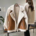 Side view of women's oversized sherpa jacket highlighting relaxed fit and hooded neckline