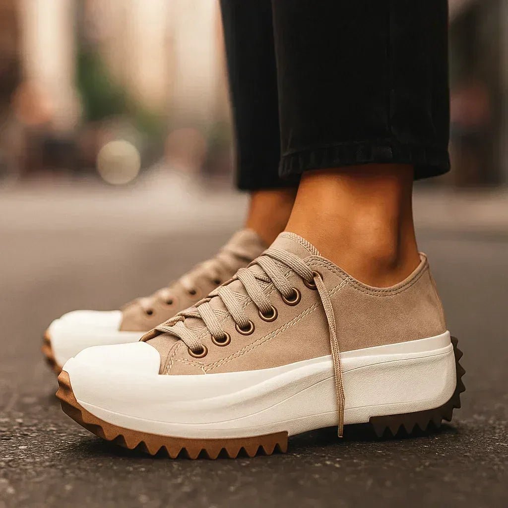 Women's platform trainers with lace-up front and padded insole, styled for casual everyday wear