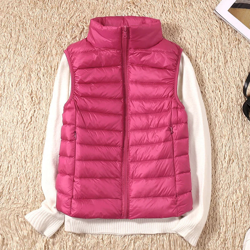 Close-up of quilted fabric texture and padded channels on women's sleeveless puffer gilet