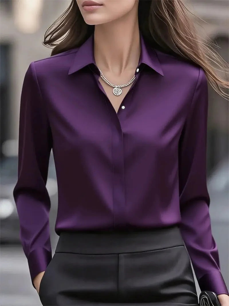 Women's long sleeve blouse in black satin suitable for professional and evening settings
