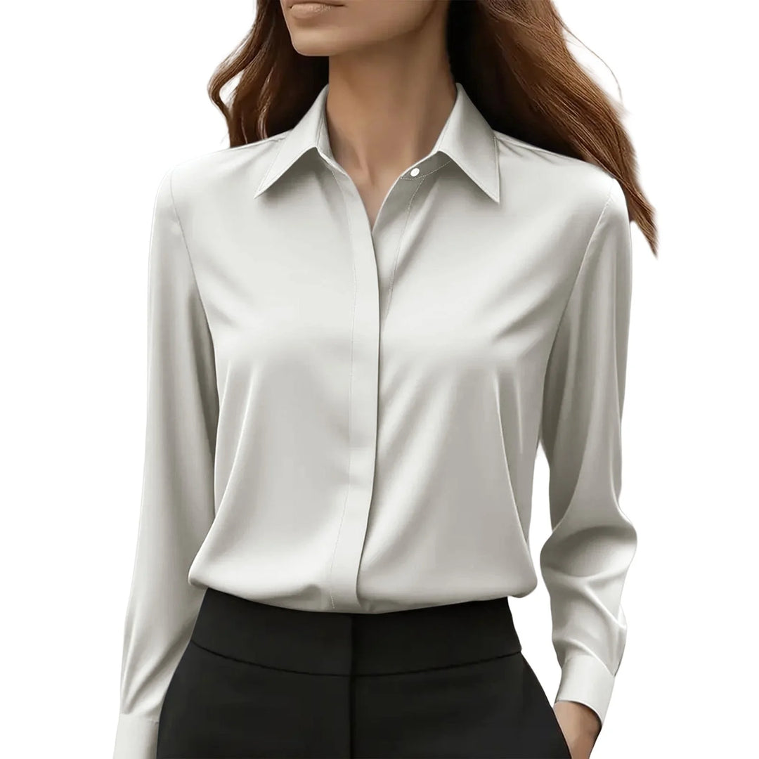 Back view of tailored satin blouse demonstrating structured fit and drape