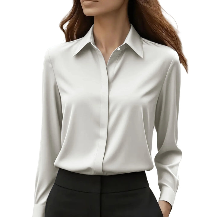 Back view of tailored satin blouse demonstrating structured fit and drape