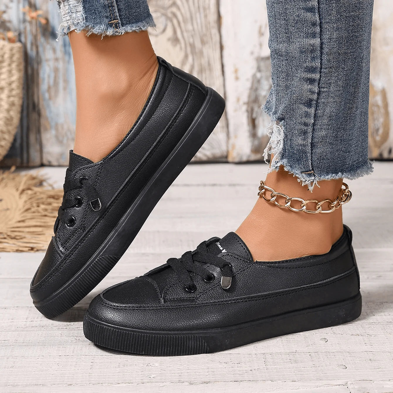 Women's white casual trainers with adjustable lace closure and rounded toe shape