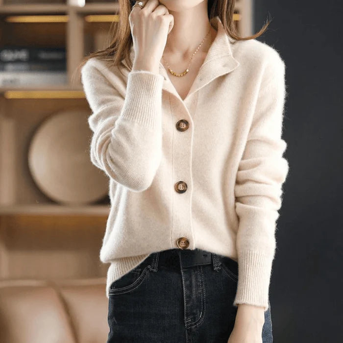 Detail of extended ribbed cuffs on women's button front knit cardigan