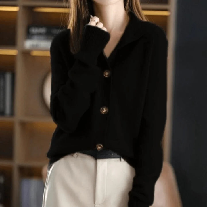 Front view of beige knit cardigan showing full button placket and collar detail