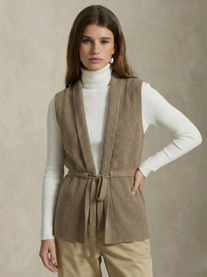 Model in the cashmere vest styled for a relaxed yet polished daytime outfit