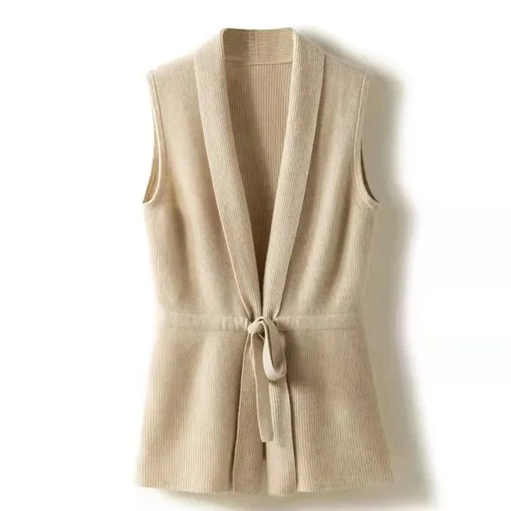Close-up of the ribbed texture and soft hand feel of the knit vest