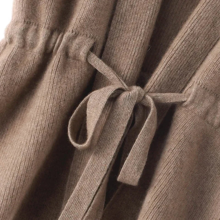 Detail of the waist tie cinched at the side for an adjustable fit