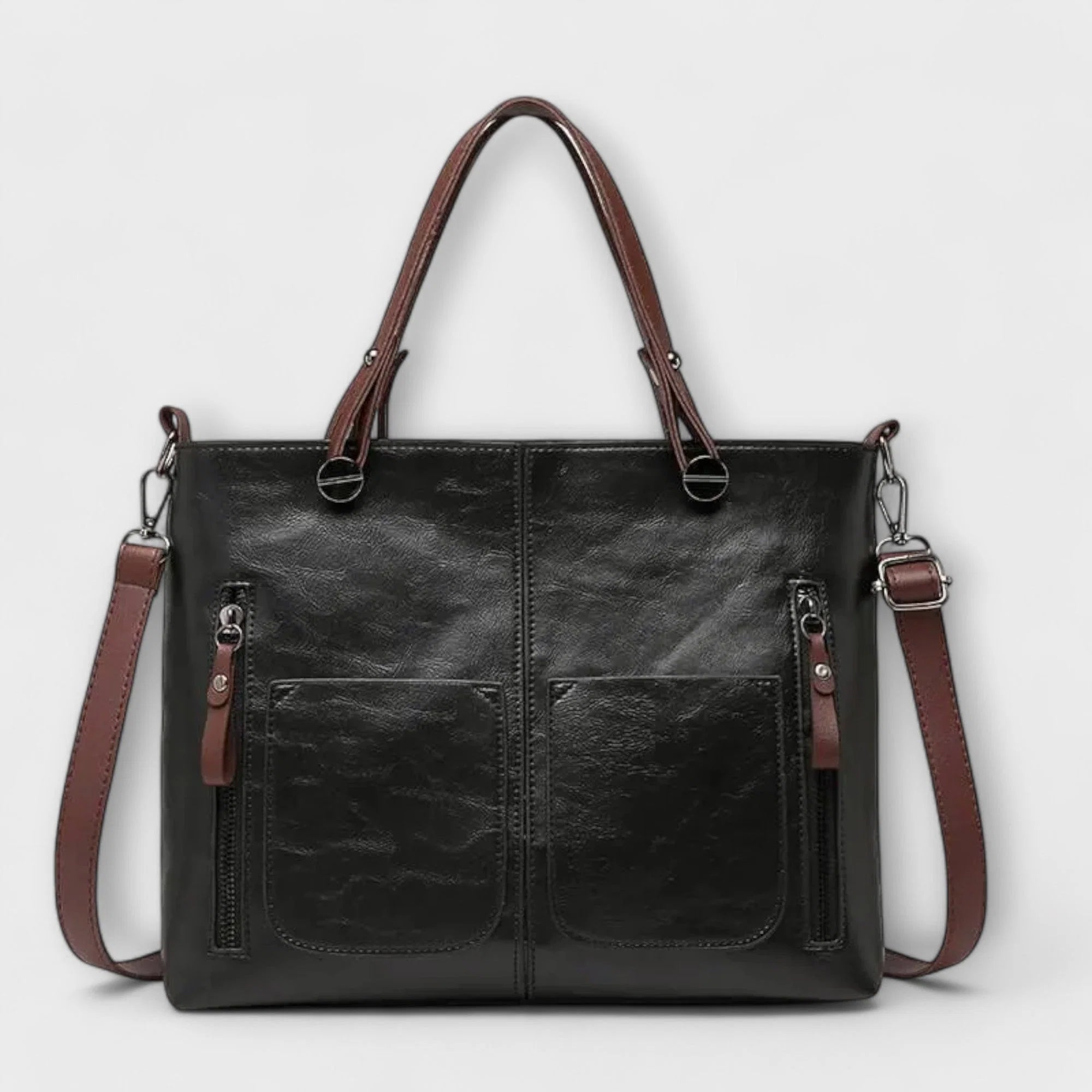 Structured tote bag featuring contrast stitching and metal hardware detailing throughout