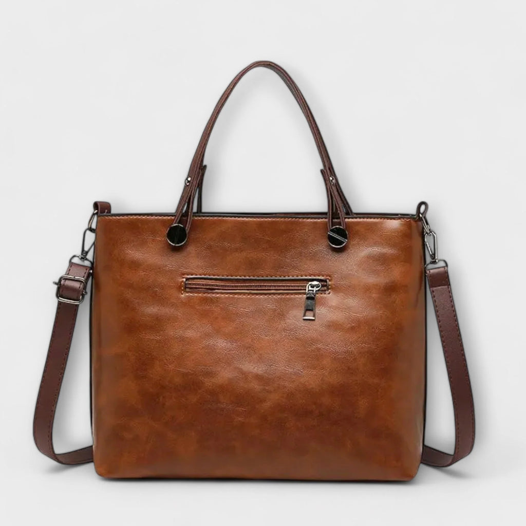 Women's tote bag shown from rear angle highlighting shoulder strap attachment points