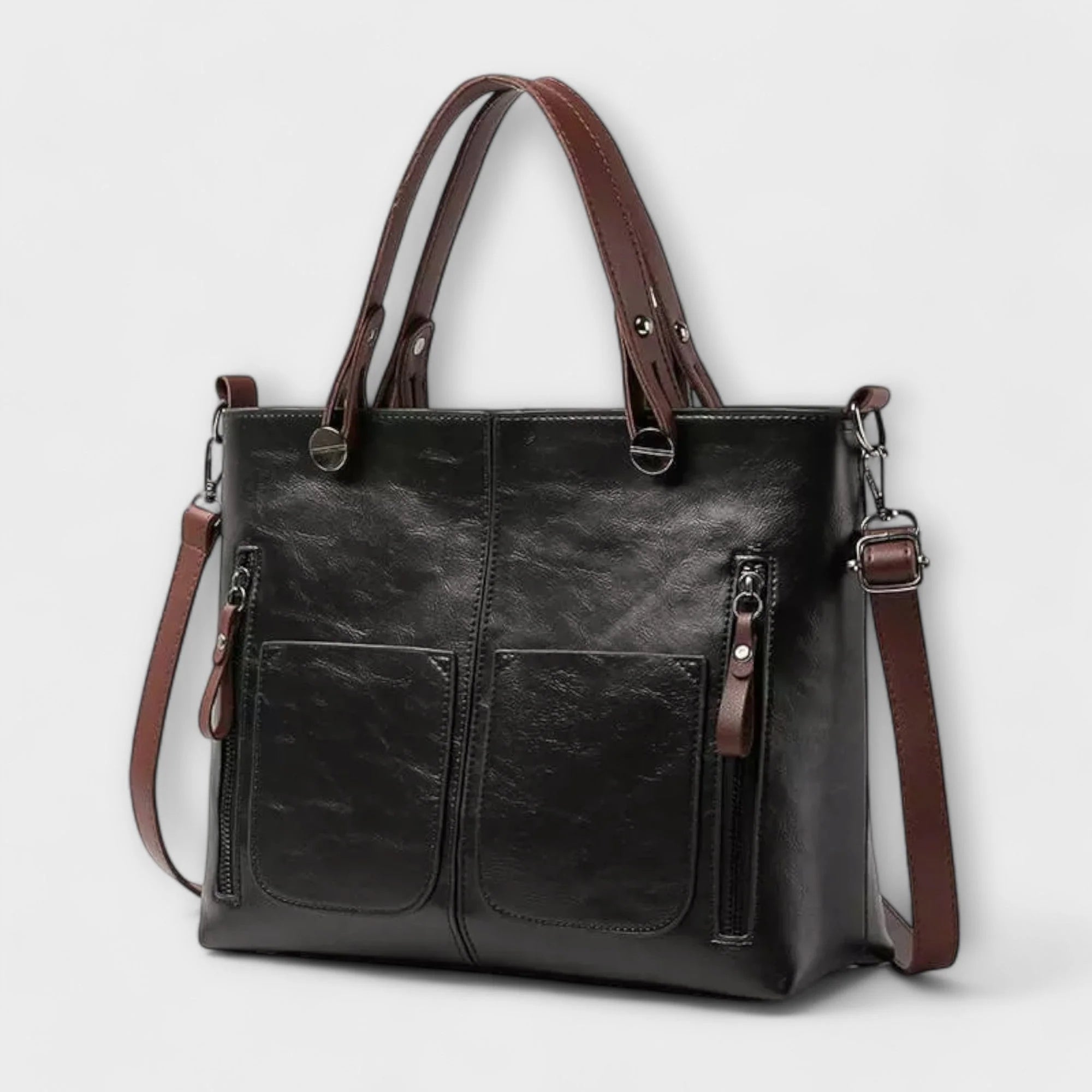 Close-up of tote bag handles and top opening with reinforced stitching detail