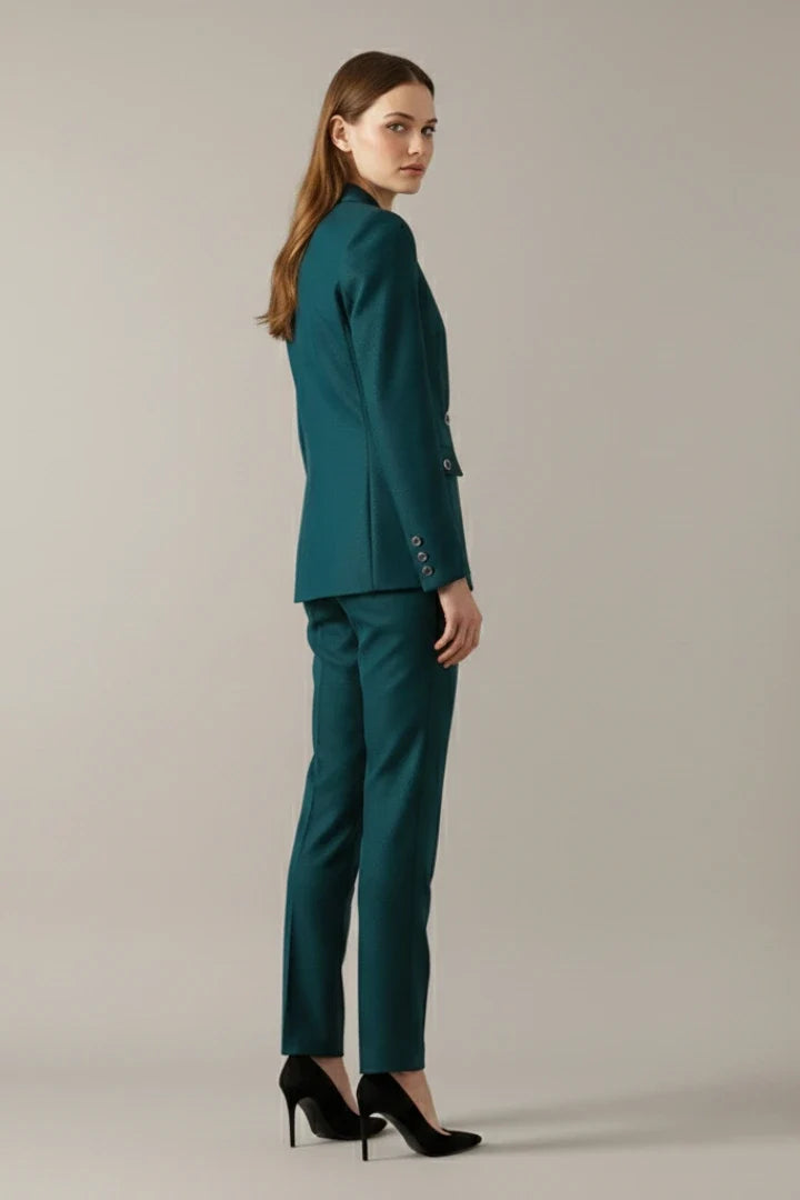 Structured women's blazer in teal with decorative gold rings and tailored silhouette for office wear