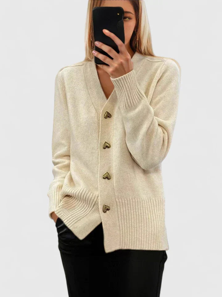 Women's knit cardigan showing relaxed fit and structured drape