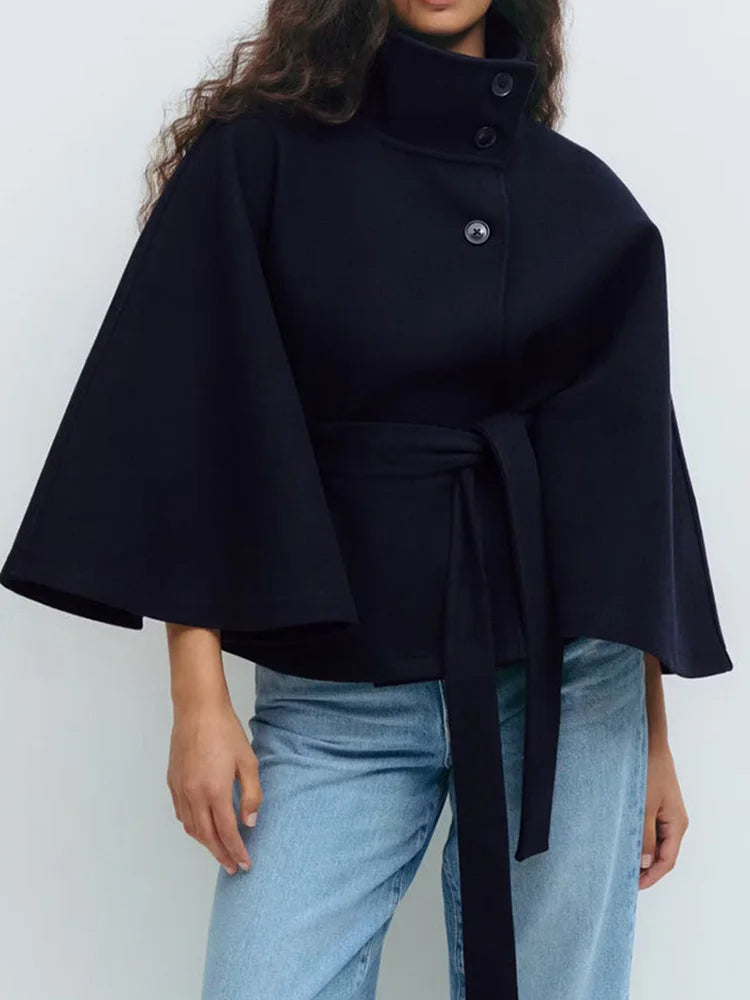 Wool cape coat in navy showing versatile colour option