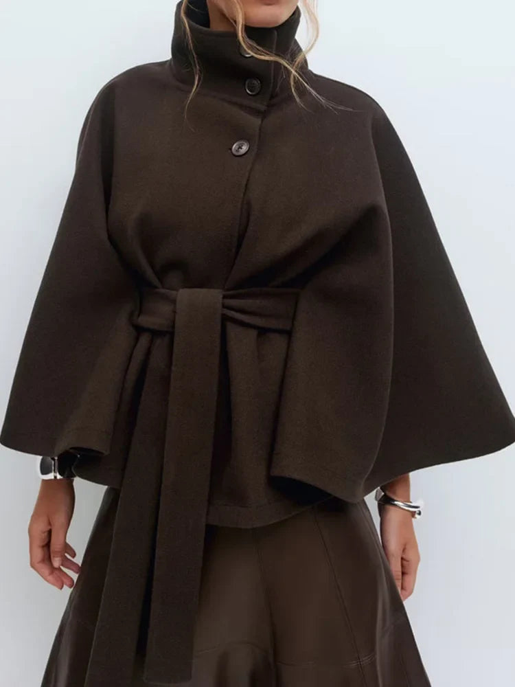 Coffee-toned wool cape coat styled for winter occasions