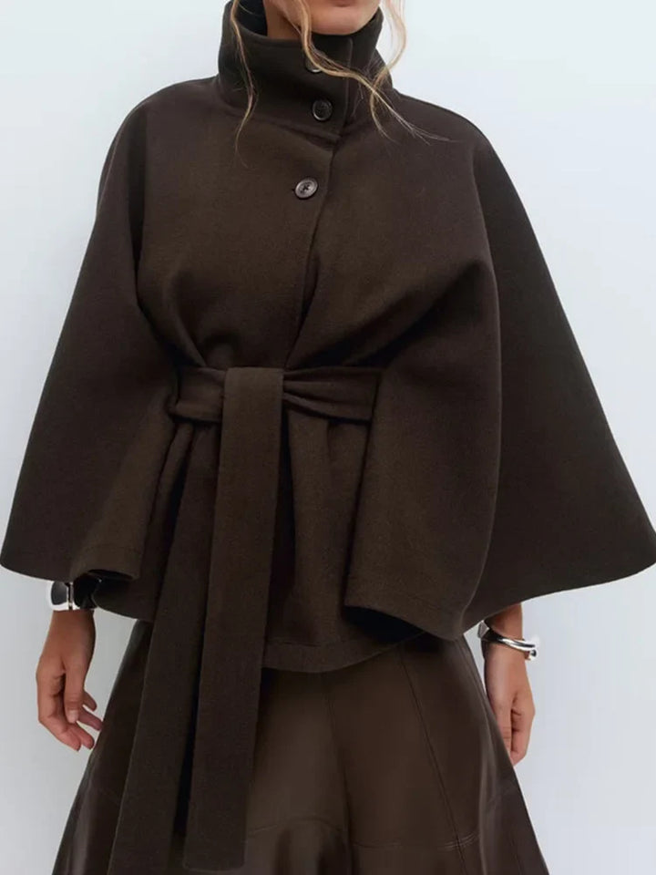 Coffee-toned wool cape coat styled for winter occasions