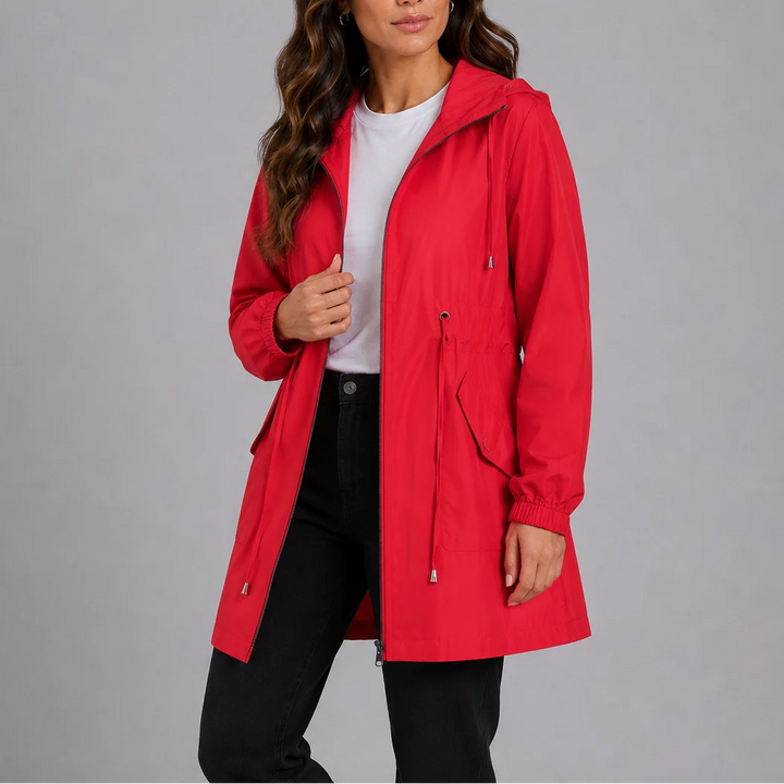 Side angle of beige rain coat showing regular fit silhouette and functional hood