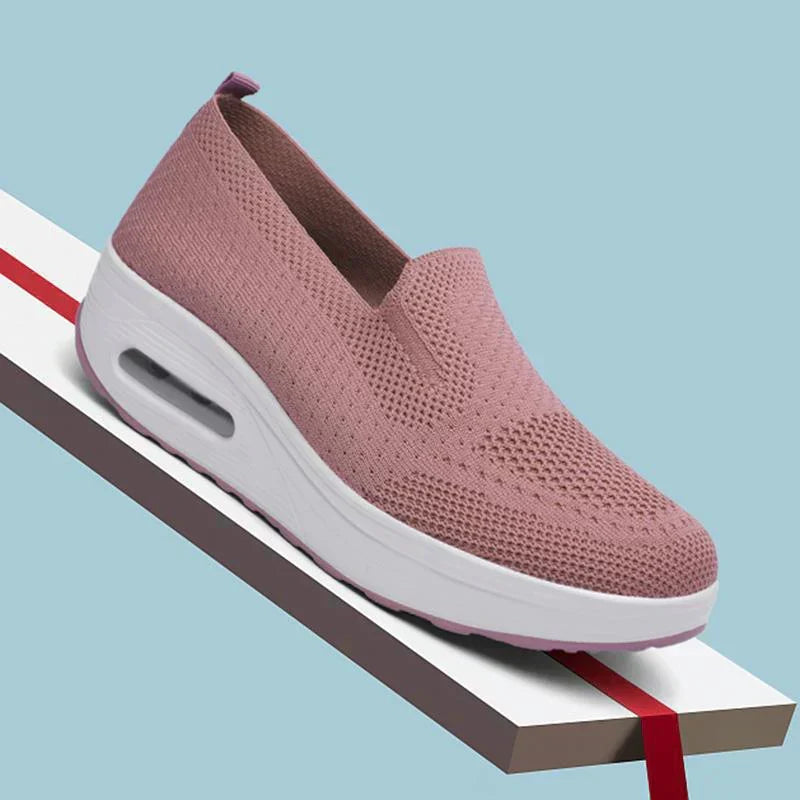 Women's platform trainers in grey with white contrast sole and breathable mesh construction
