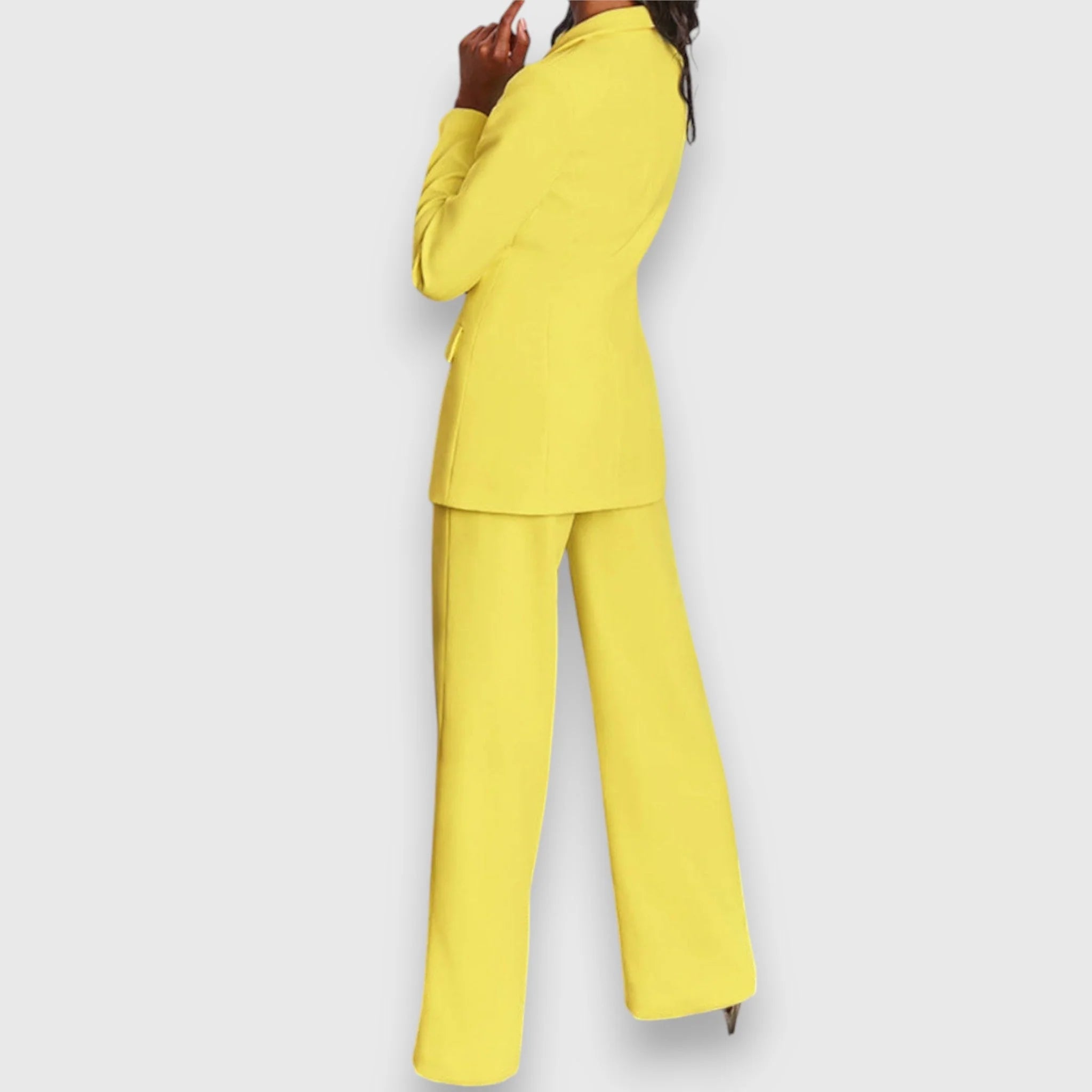 Women's wide-leg trousers from suit set showing high-rise waist and leg width